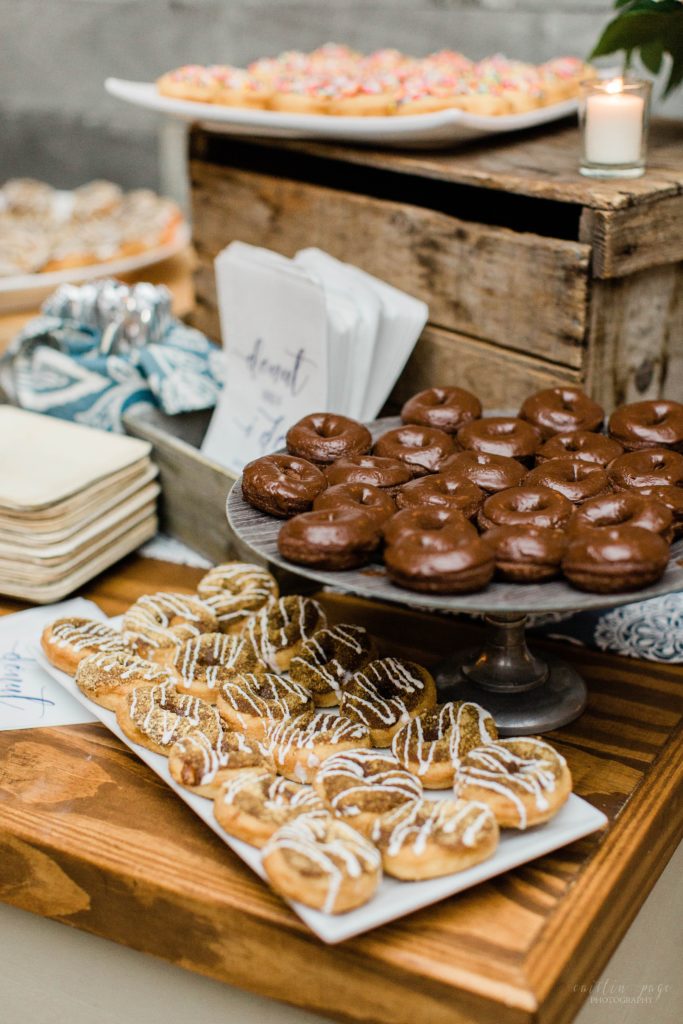 Wedding dessert bar set up with mini chocolate donuts