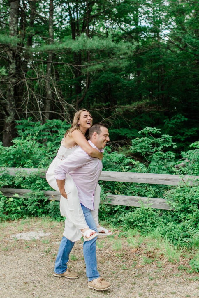 Man carrying woman on his back