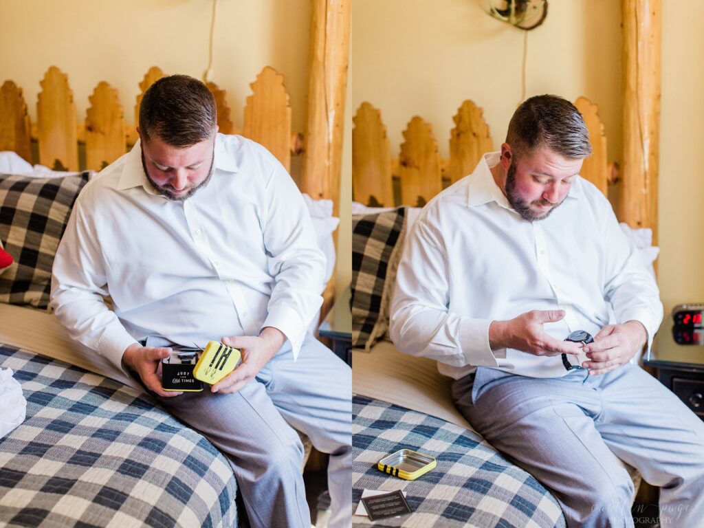 Groom sitting on bed opening gift