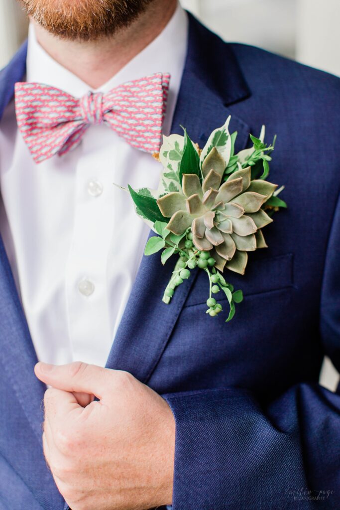 Groom boutonniere with large succulent