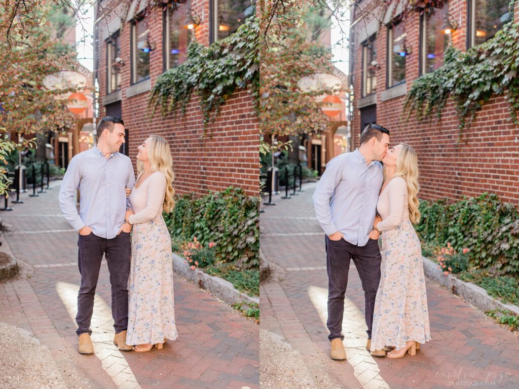 Couple standing in brick alley in Portsmouth