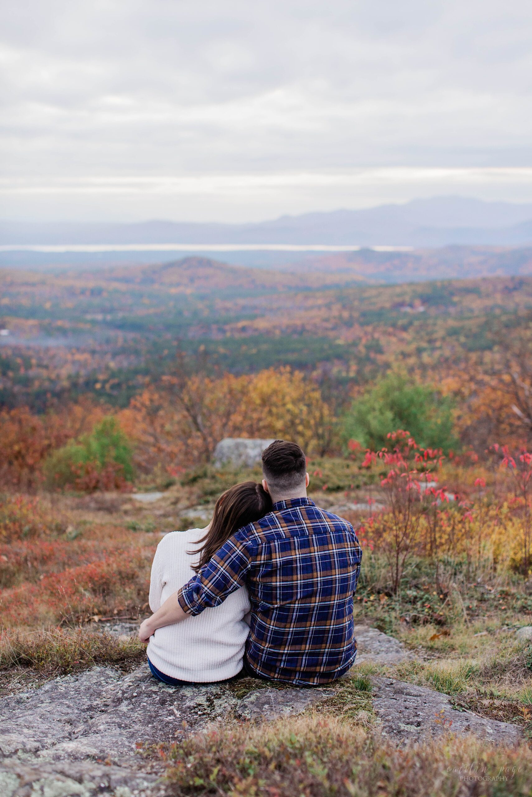 Couple sitting together looking out at view