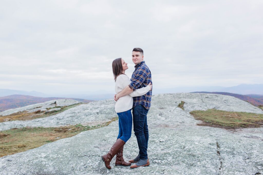 Couple standing together on top of Foss Mountain