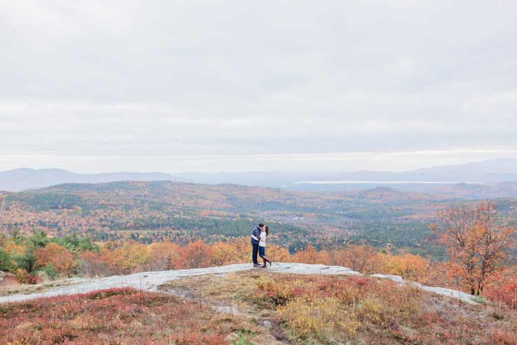 Couple standing on edge of Foss Mountain