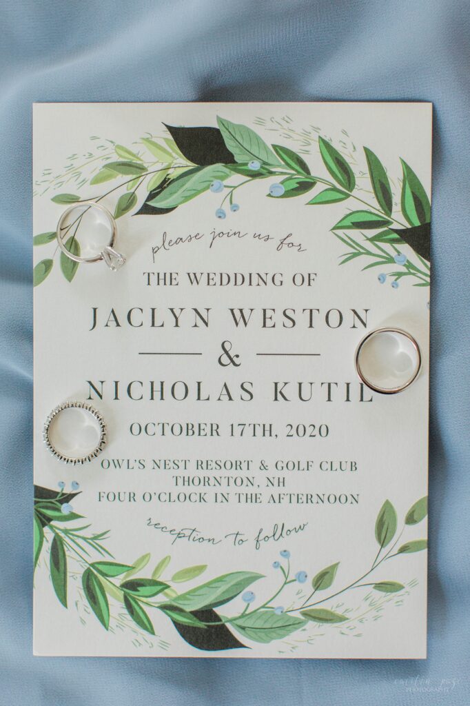 Wedding invitation with wedding rings on it
