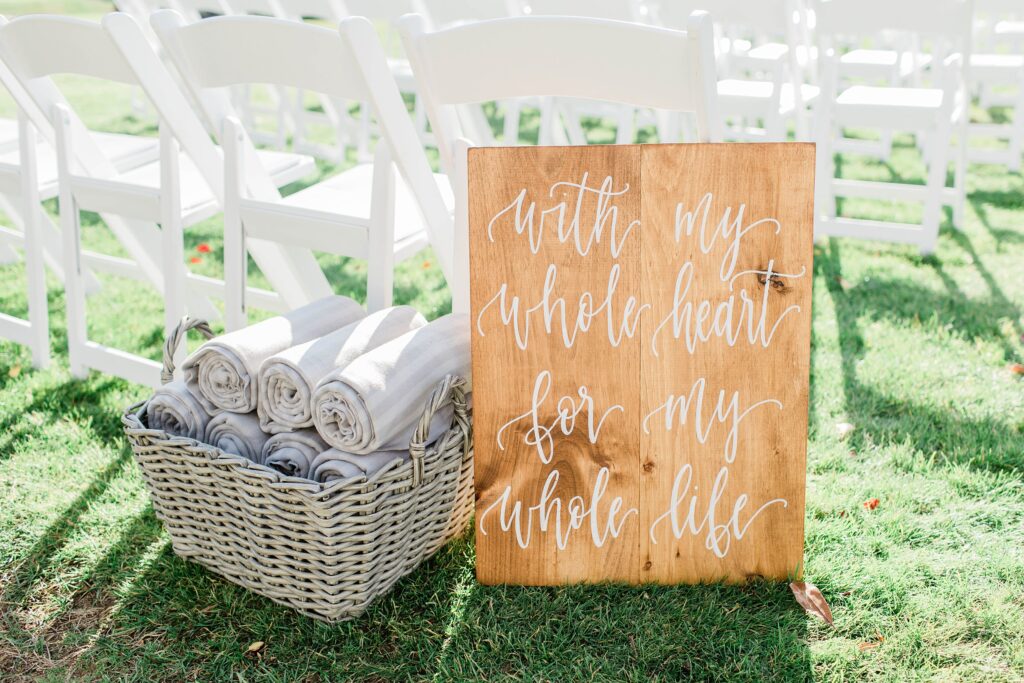 Sign and blankets at wedding ceremony
