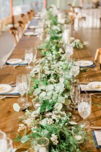 Greenery runner on wooden farm table