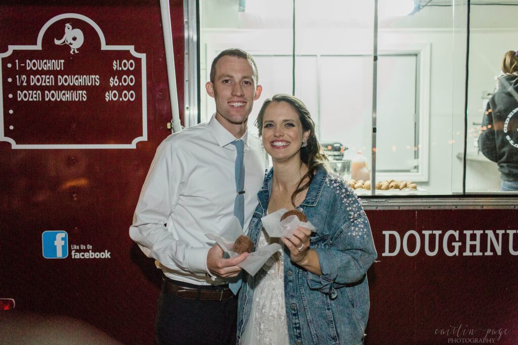 Bride and groom with donut truck