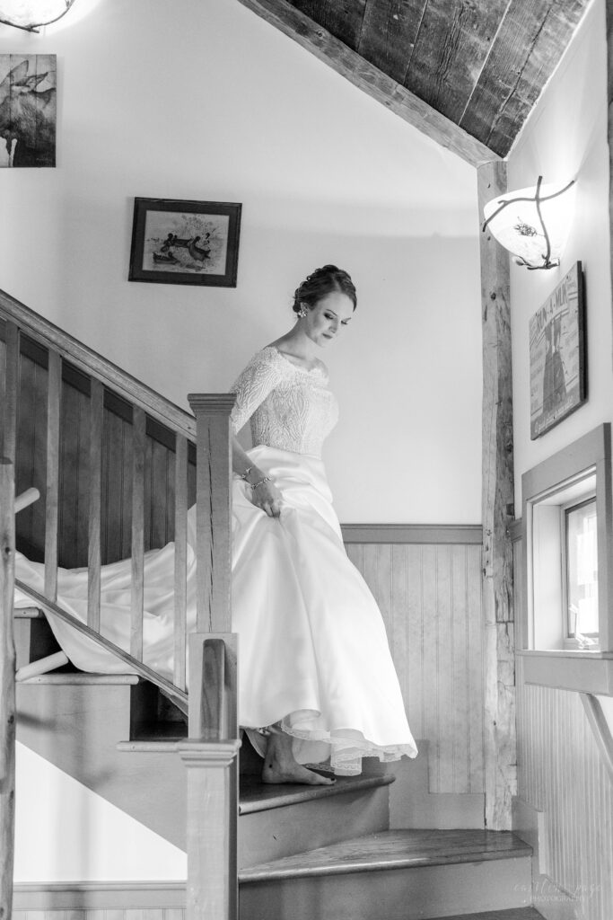 Bride walking down the stairs before wedding