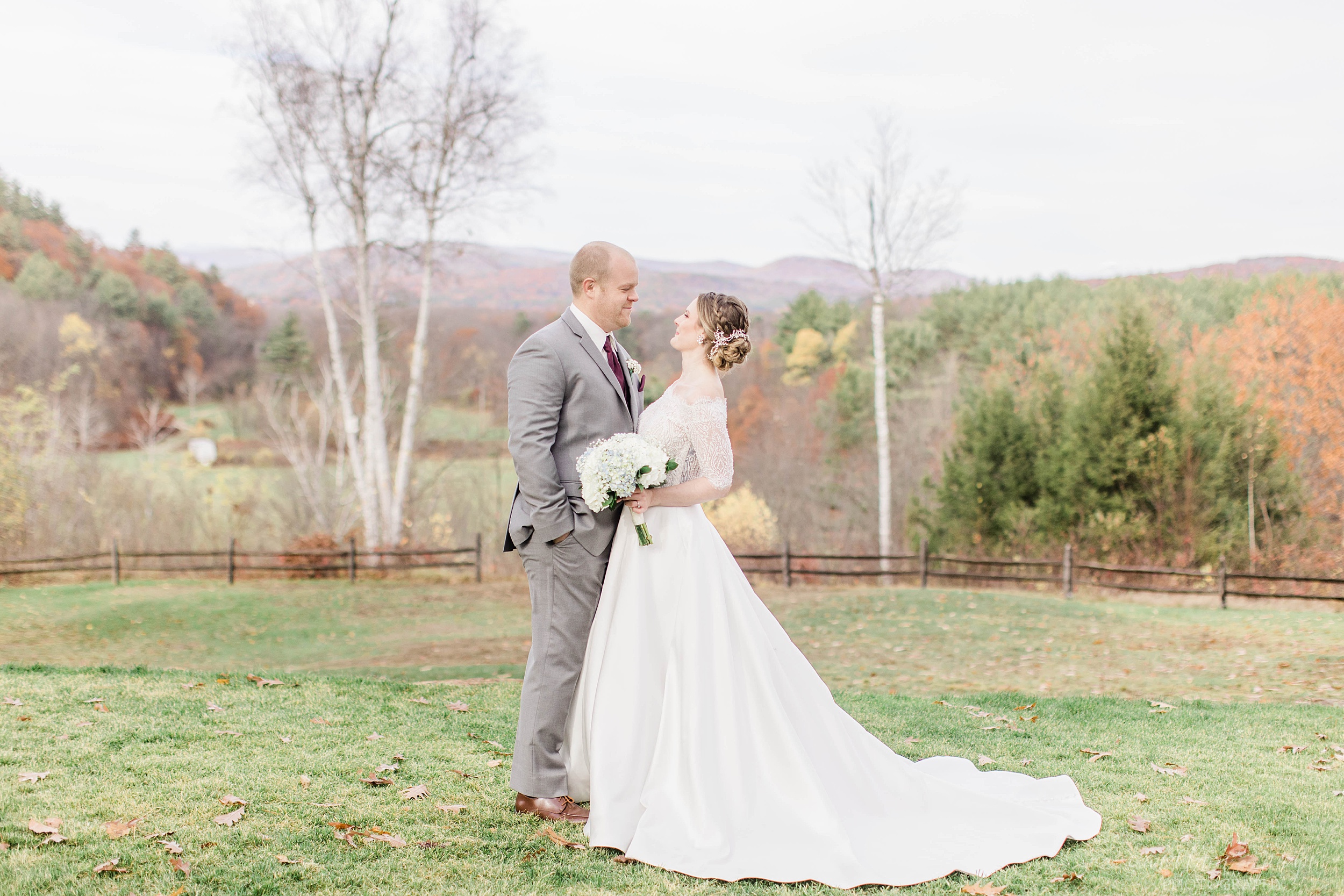 Bride and groom fall wedding portraits at Barn on the Pemi