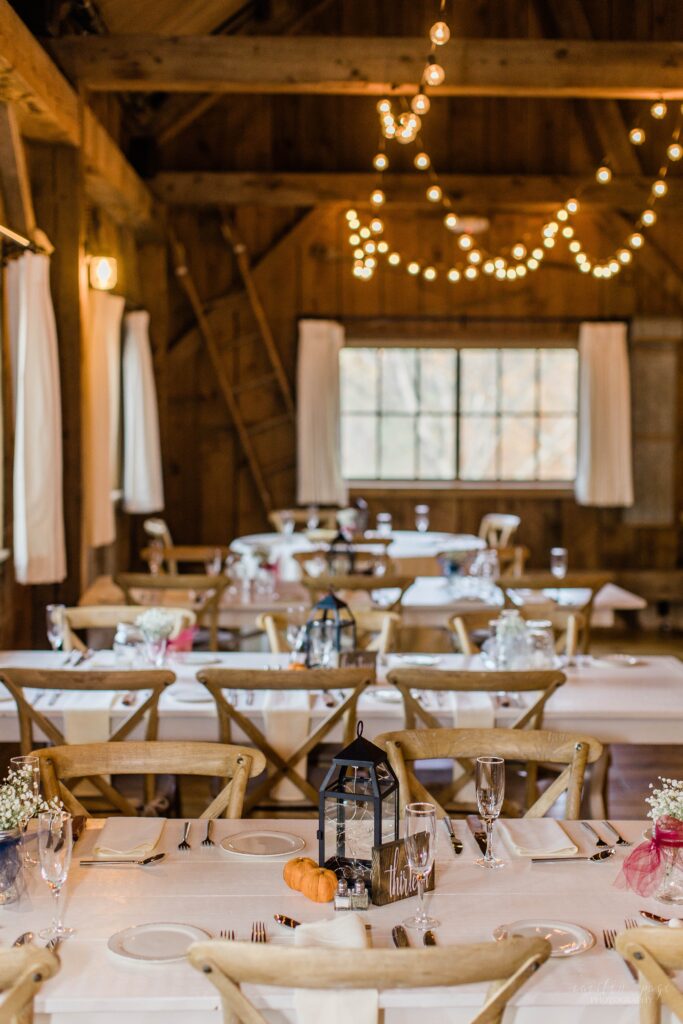 Fall wedding reception decor in barn