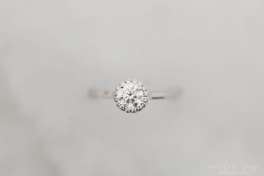 Solitaire engagement ring with halo setting