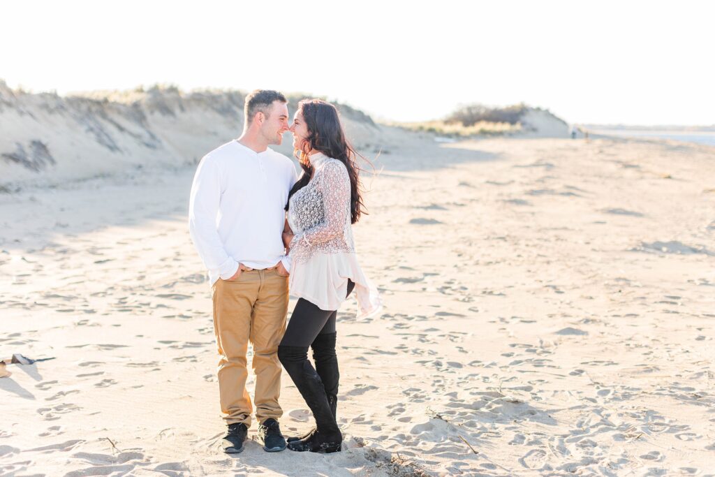 Couple standing together on the beach