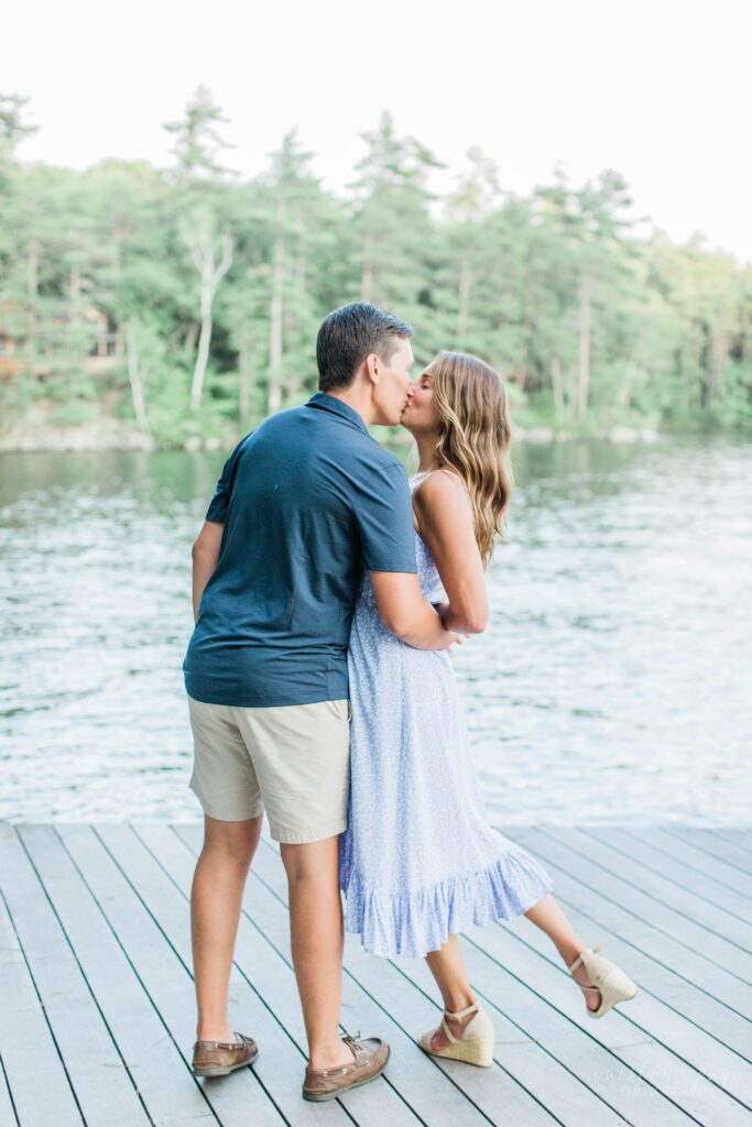 Couple dancing on dock together