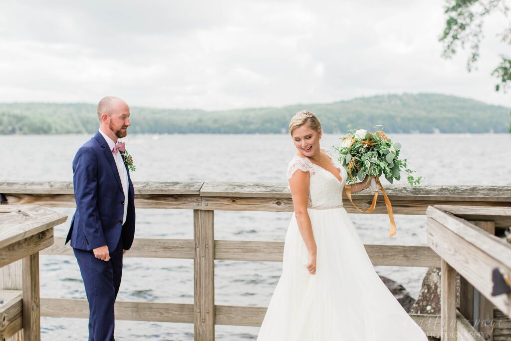 Bride and groom first look on the lake