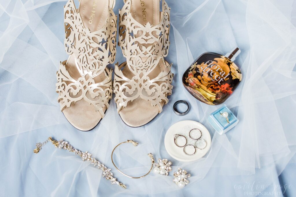 Bridal details with jewelry shoes and perfume