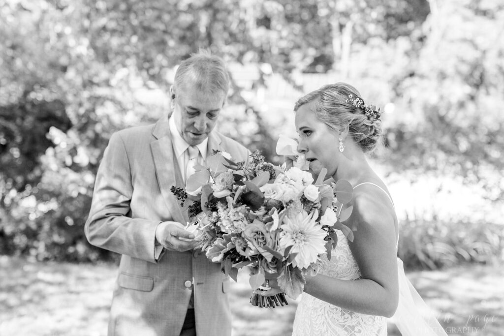 Bride and dad crying after first look