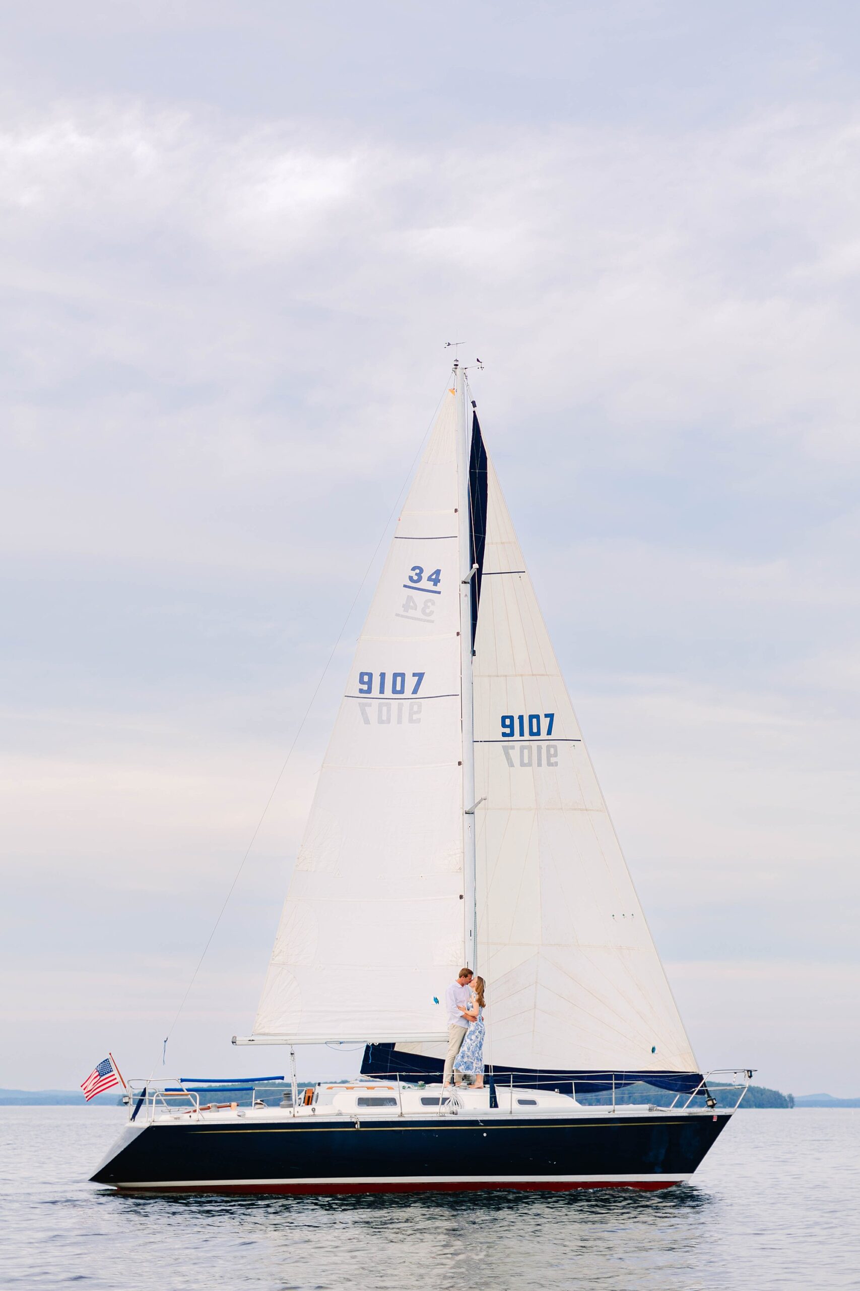 Lake Winnipesaukee Sailboat Engagement Photos New Hampshire Caitlin Page Photography