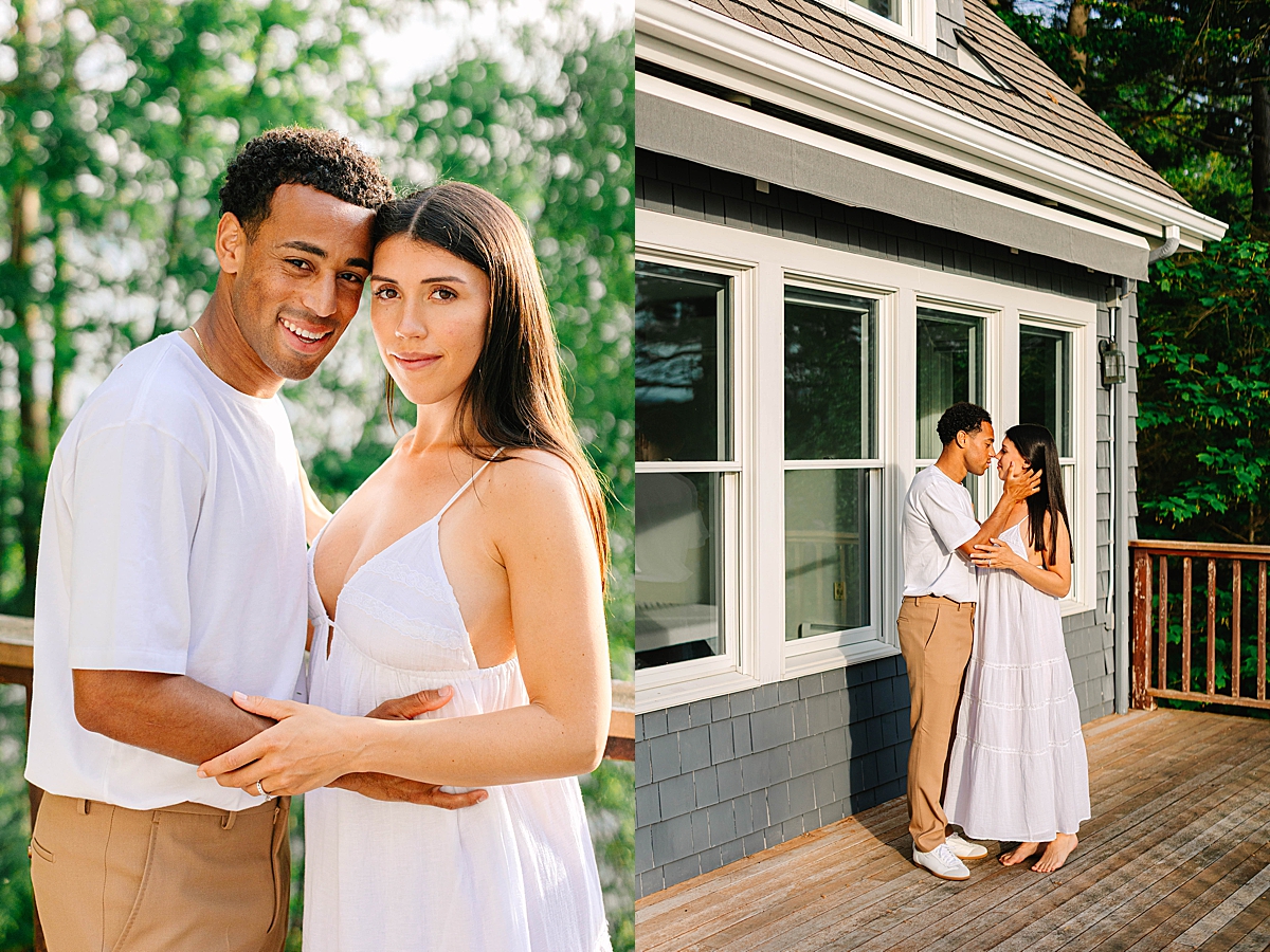Couple standing close together on a wooden deck, with trees softly blurred in the background.